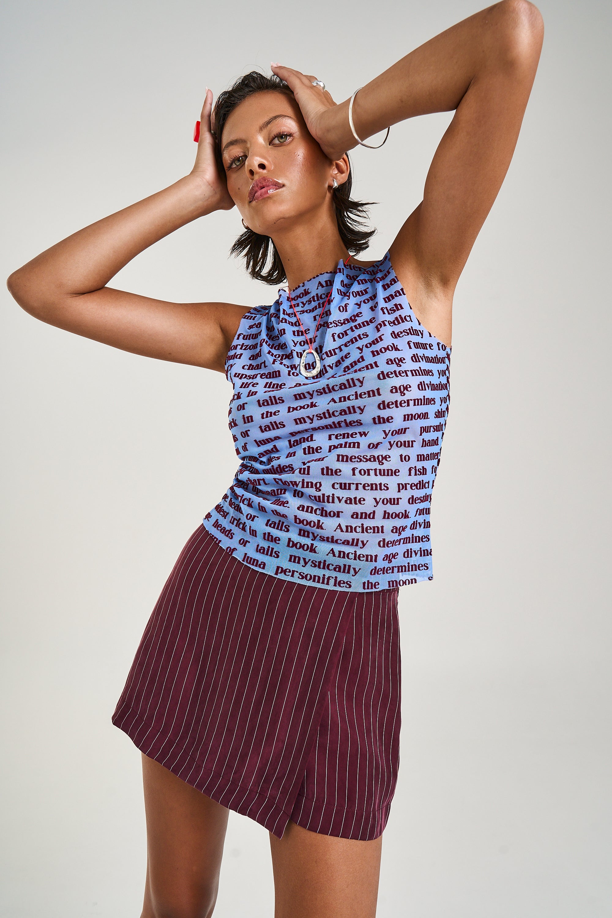 A-SYM SKORT - KINA PINSTRIPE